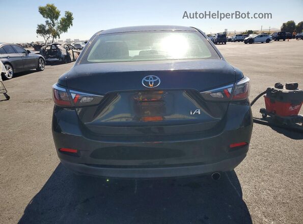 3MYDLBYV3HY158047 2017 TOYOTA YARIS Black Вид ззаду