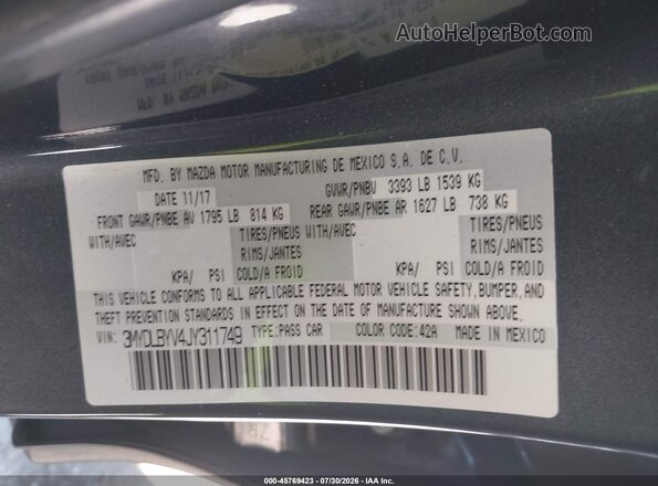 3MYDLBYV4JY311749 2018 TOYOTA YARIS IA Gray Widok komory silnika