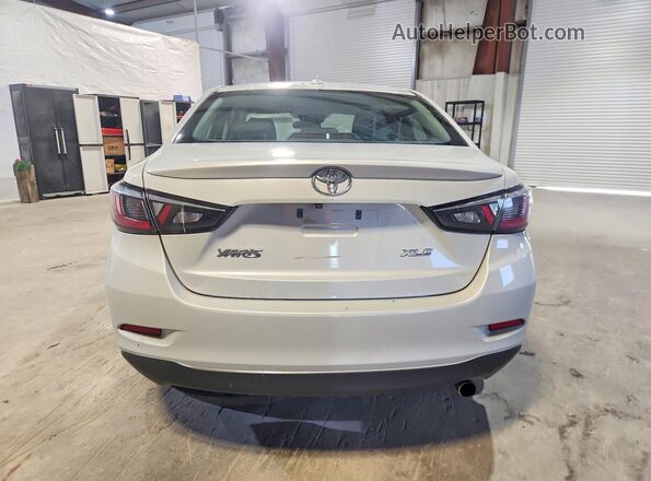 3MYDLBYV4KY517770 2019 TOYOTA YARIS Silver Rear view