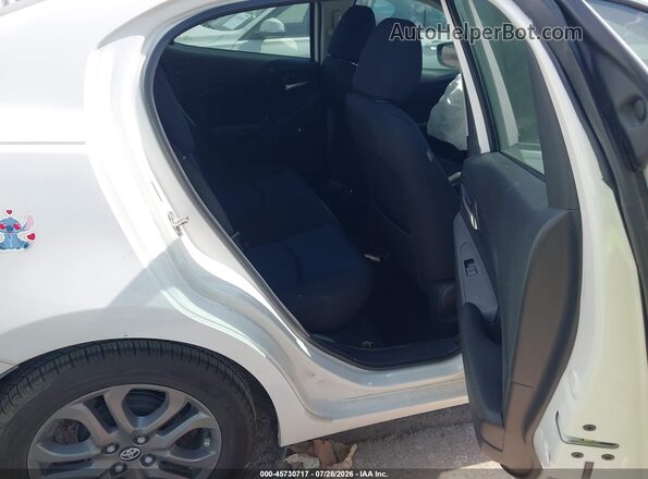 3MYDLBYV4KY520975 2019 TOYOTA YARIS White VIN კოდის სტიკერის ხედი
