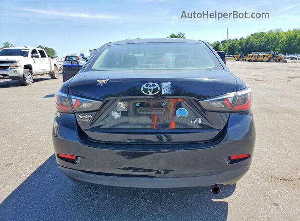 3MYDLBYV5HY163492 2017 TOYOTA YARIS Black Rear view
