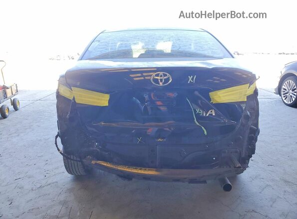 3MYDLBYV5JY323229 2018 TOYOTA YARIS Black Rear view