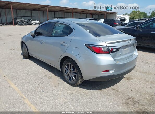 3MYDLBYV5KY506258 2019 TOYOTA YARIS Silver Tył lewy