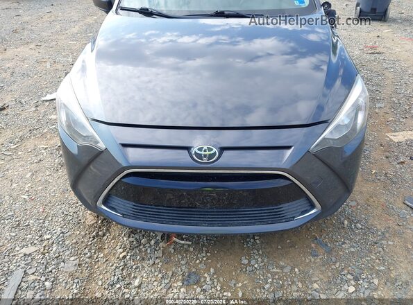 3MYDLBYV6HY173982 2017 TOYOTA YARIS IA Gray Вид задньої частини салону