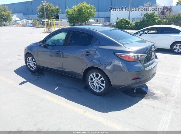 3MYDLBYV6HY186022 2017 TOYOTA YARIS IA Gray Trasero izquierdo