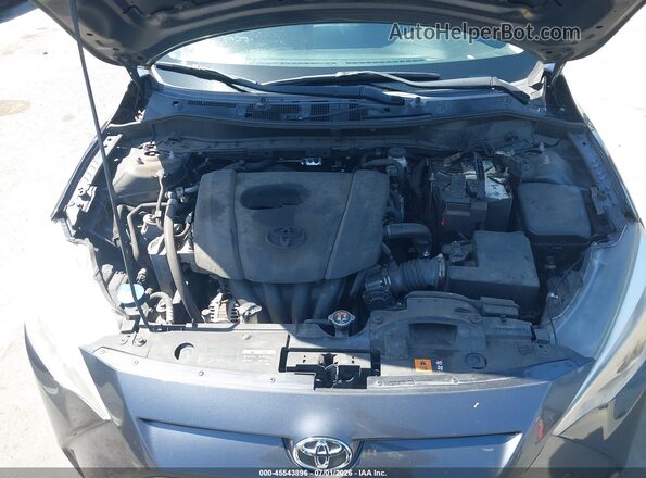 3MYDLBYV6HY186022 2017 TOYOTA YARIS IA Gray Vista trasera
