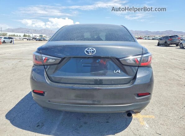 3MYDLBYV7HY174252 2017 TOYOTA YARIS Silver უკანა ხედი