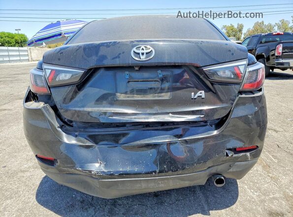 3MYDLBYV8HY192887 2017 TOYOTA YARIS Black Rear view