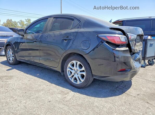 3MYDLBYV8HY192887 2017 TOYOTA YARIS Black Rear left