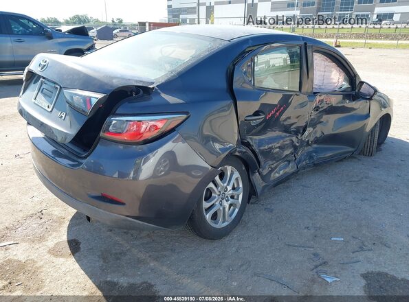 3MYDLBYV8JY316551 2018 TOYOTA YARIS IA Black Trasero derecho