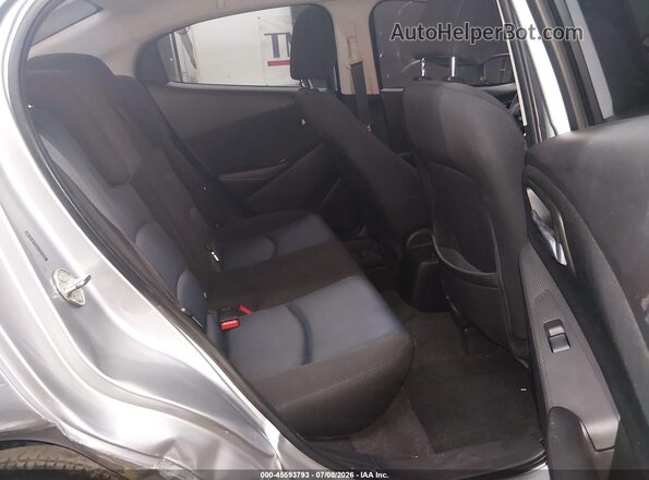 3MYDLBYV8JY321555 2018 TOYOTA YARIS IA Silver VIN sticker view