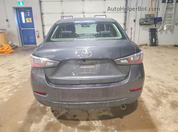3MYDLBYVXGY121737 2016 TOYOTA YARIS Gray Vista trasera
