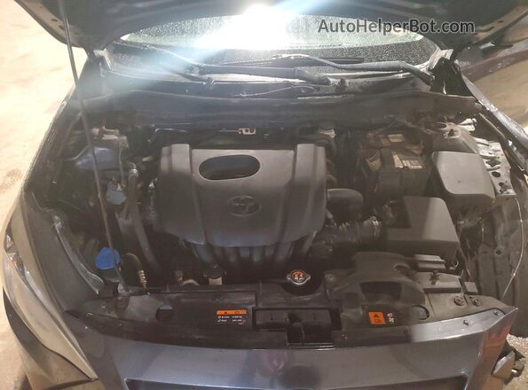 3MYDLBYVXGY121737 2016 TOYOTA YARIS Gray Vista interior trasera