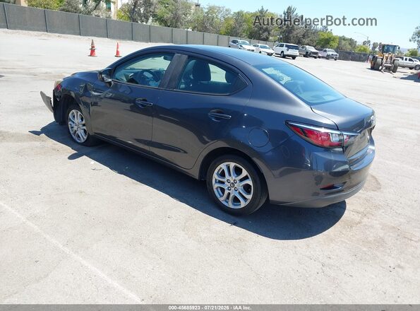3MYDLBYVXHY152617 2017 TOYOTA YARIS IA Gray Trasero izquierdo