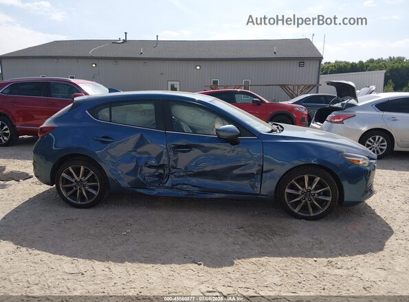 3MZBN1M37JM161123 2018 MAZDA 3 Blue Vista interior trasera