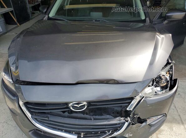 3MZBN1U71JM161394 2018 MAZDA 3 Charcoal Vista interior trasera