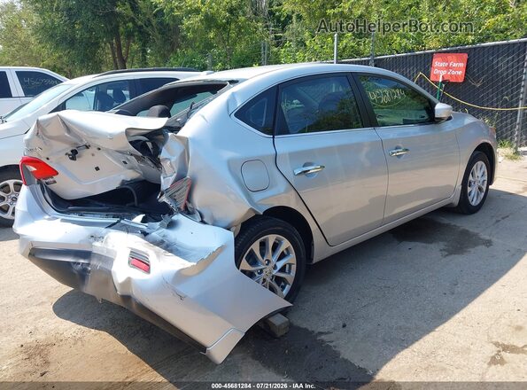 3N1AB7AP0JY216766 2018 NISSAN SENTRA Silver Trasero derecho