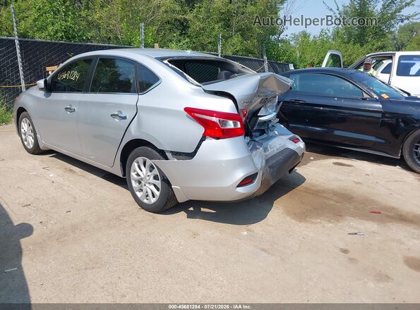 3N1AB7AP0JY216766 2018 NISSAN SENTRA Silver Trasero izquierdo