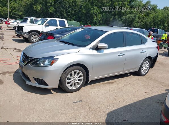 3N1AB7AP0JY216766 2018 NISSAN SENTRA Silver Vista tres cuartos delantera izquierda