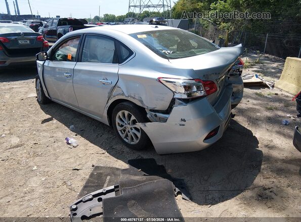 3N1AB7AP0JY216931 2018 NISSAN SENTRA Серебряный Задняя левая четверть