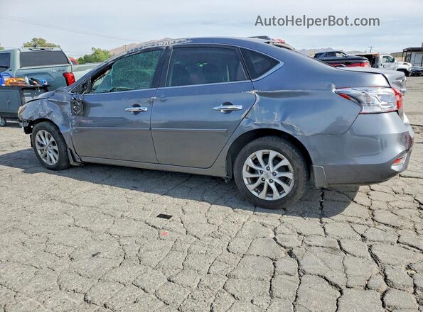 3N1AB7AP0JY230439 2018 NISSAN SENTRA Gray Trasero izquierdo