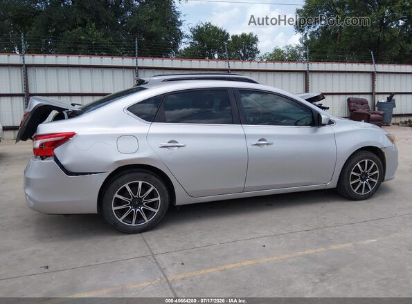 3N1AB7AP1GY276256 2016 NISSAN SENTRA Silver Rear interior view