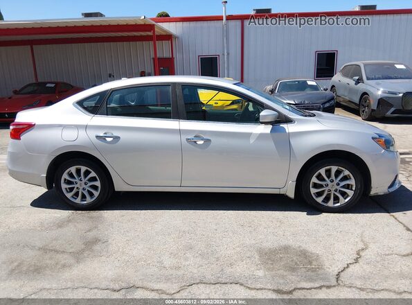 3N1AB7AP1KY394526 2019 NISSAN SENTRA Silver უკანა სალონის ხედი