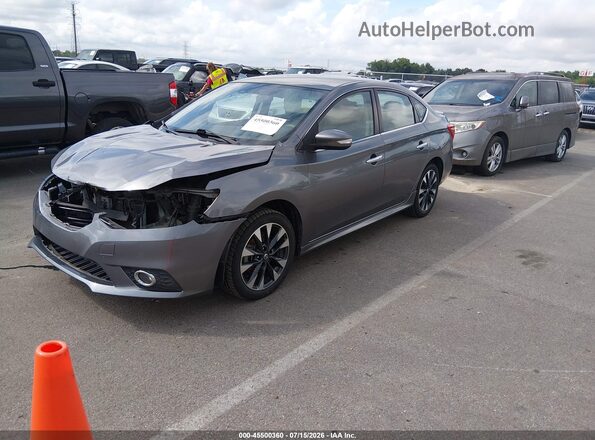 3N1AB7AP1KY450285 2019 NISSAN SENTRA Gray Vista tres cuartos delantera izquierda