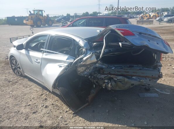 3N1AB7AP2GY240690 2016 NISSAN SENTRA Silver Trasero izquierdo