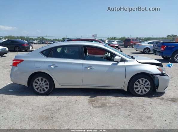 3N1AB7AP2JY232743 2018 NISSAN SENTRA Silver Вид задньої частини салону