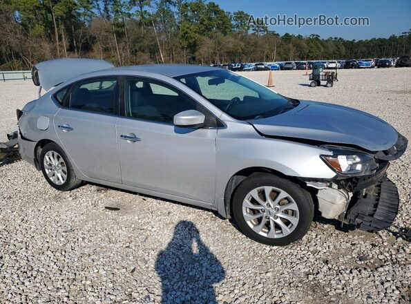 3N1AB7AP3JL662777 2018 NISSAN SENTRA Серебряный Передняя правая четверть