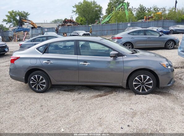 3N1AB7AP3JY219046 2018 NISSAN SENTRA Gray Rear interior view