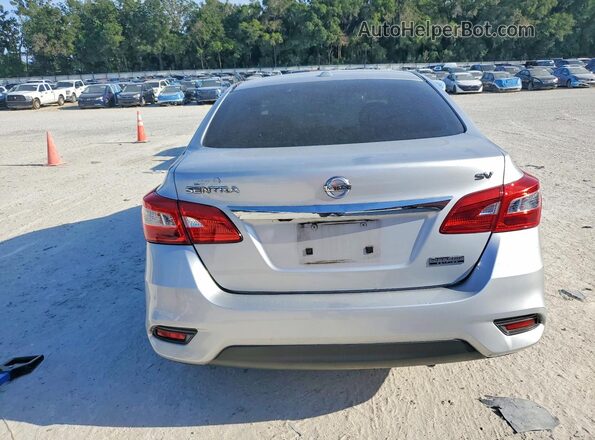 3N1AB7AP3KY292032 2019 NISSAN SENTRA Silver Rear view
