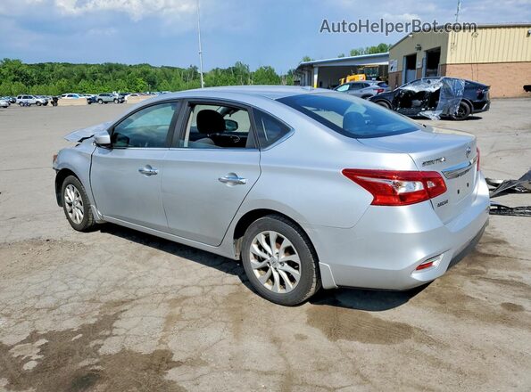 3N1AB7AP3KY378506 2019 NISSAN SENTRA Серебряный Задняя левая четверть