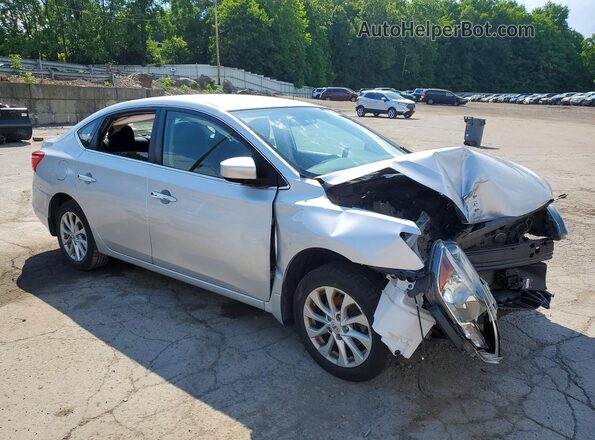3N1AB7AP3KY378506 2019 NISSAN SENTRA Серебряный Передняя правая четверть