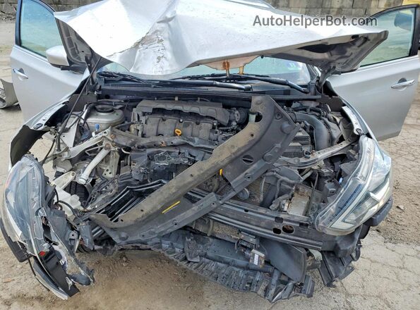 3N1AB7AP3KY378506 2019 NISSAN SENTRA Серебряный Вид задней части салона