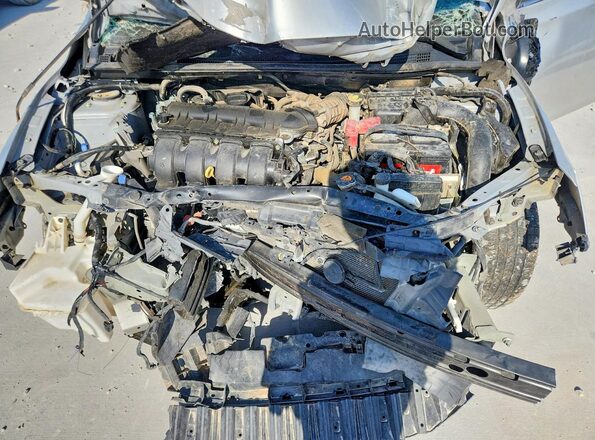 3N1AB7AP4GL677474 2016 NISSAN SENTRA Silver Вид задньої частини салону