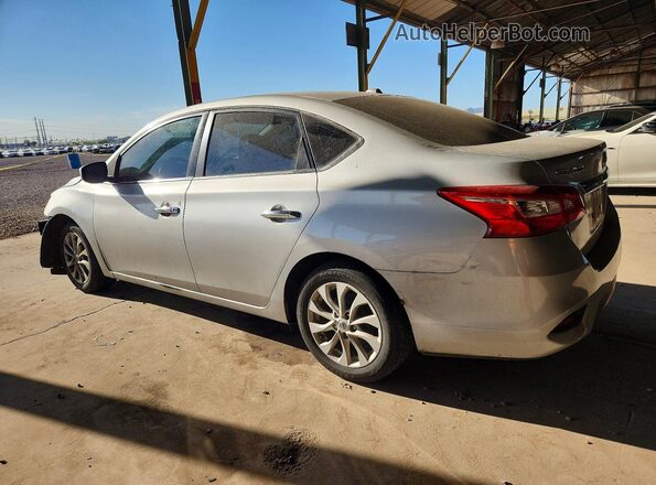 3N1AB7AP4JL627634 2018 NISSAN SENTRA Silver Trasero izquierdo