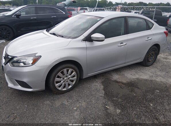 3N1AB7AP4JY227446 2018 NISSAN SENTRA Серебряный Передняя левая четверть
