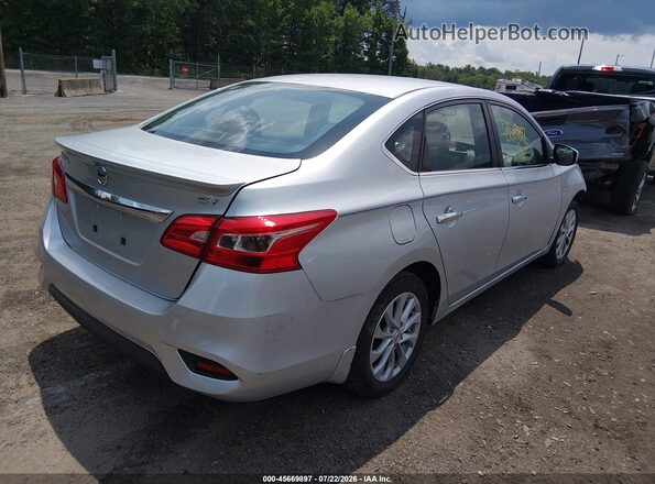 3N1AB7AP4KY240439 2019 NISSAN SENTRA Silver Rear right