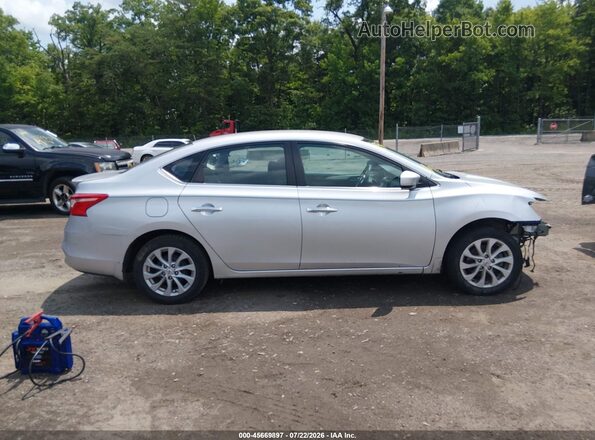 3N1AB7AP4KY240439 2019 NISSAN SENTRA Silver Rear interior view