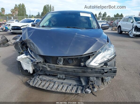 3N1AB7AP4KY394178 2019 NISSAN SENTRA Gray Вид задньої частини салону