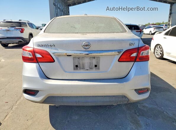 3N1AB7AP5JY245681 2018 NISSAN SENTRA Серебряный Вид сзади