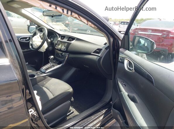 3N1AB7AP5JY282956 2018 NISSAN SENTRA Black Front interior view