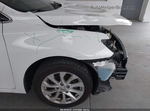 3N1AB7AP5KY313141 2019 NISSAN SENTRA White Front view