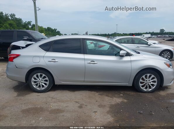 3N1AB7AP5KY320168 2019 NISSAN SENTRA Silver Rear interior view