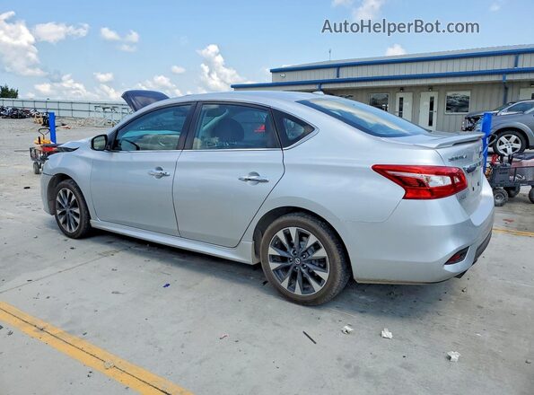 3N1AB7AP6KY211122 2019 NISSAN SENTRA Silver Trasero izquierdo