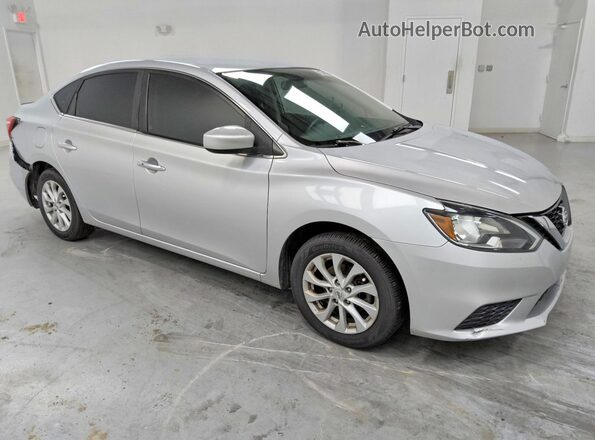 3N1AB7AP6KY295877 2019 NISSAN SENTRA Silver Delantero derecho