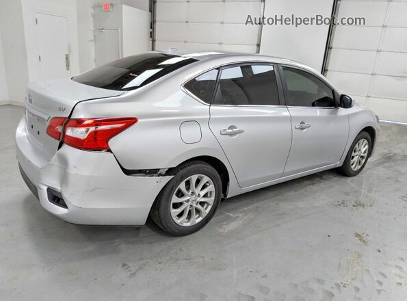 3N1AB7AP6KY295877 2019 NISSAN SENTRA Silver Trasero derecho