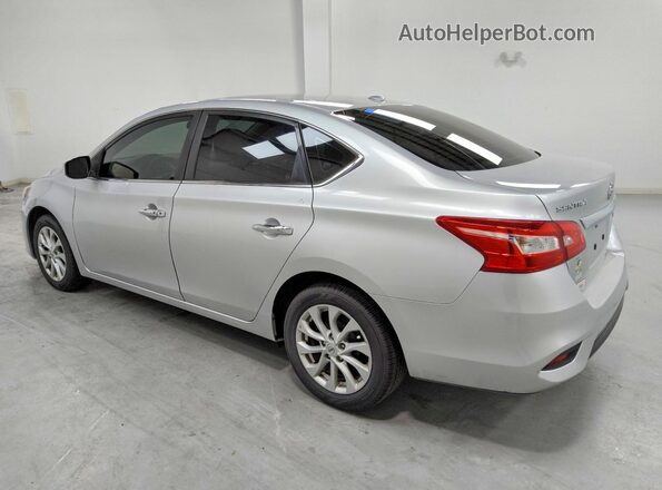 3N1AB7AP6KY295877 2019 NISSAN SENTRA Silver Trasero izquierdo